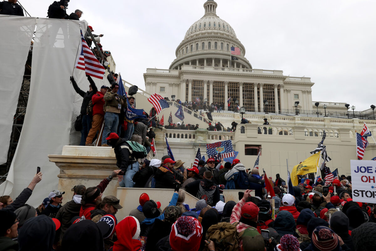 Protesters and rioters gather outside the U.S. Capitol Building
