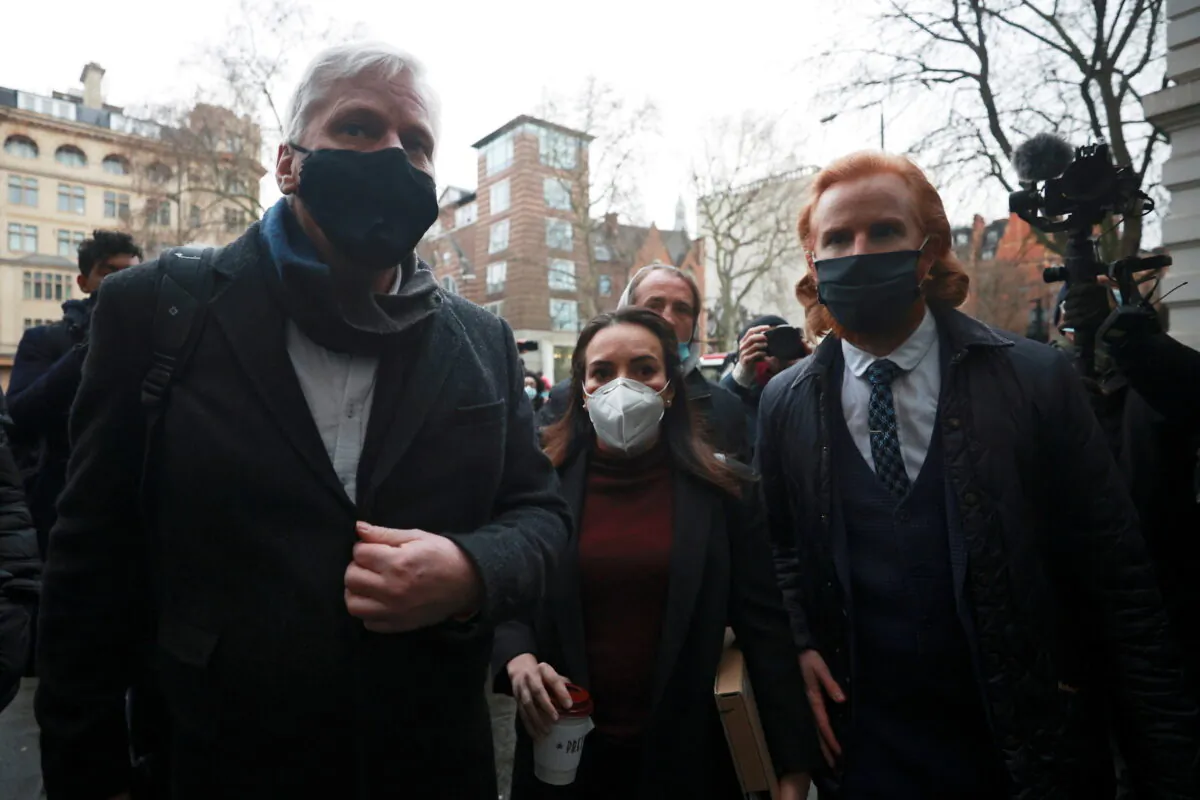 Stella Morris, partner of WikiLeaks founder Julian Assange, Editor in Chief of WikiLeaks Kristinn Hrafnsson and WikiLeaks Ambassador Joseph Farrell arrive at the Westminster Magistrates Court ahead of a hearing as lawyers for WikiLeaks founder Julian Assange seek bail for their client in London, Britain on Jan. 6, 2021. (Hannah McKay/Reuters)