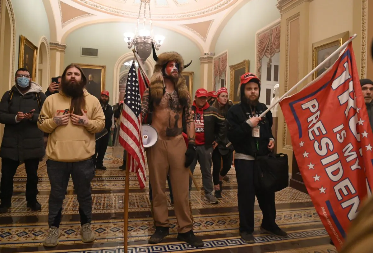 A group of protesters enter the U.S. Capitol in Washington on Jan. 6, 2021. (Saul Loeb/AFP via Getty Images)