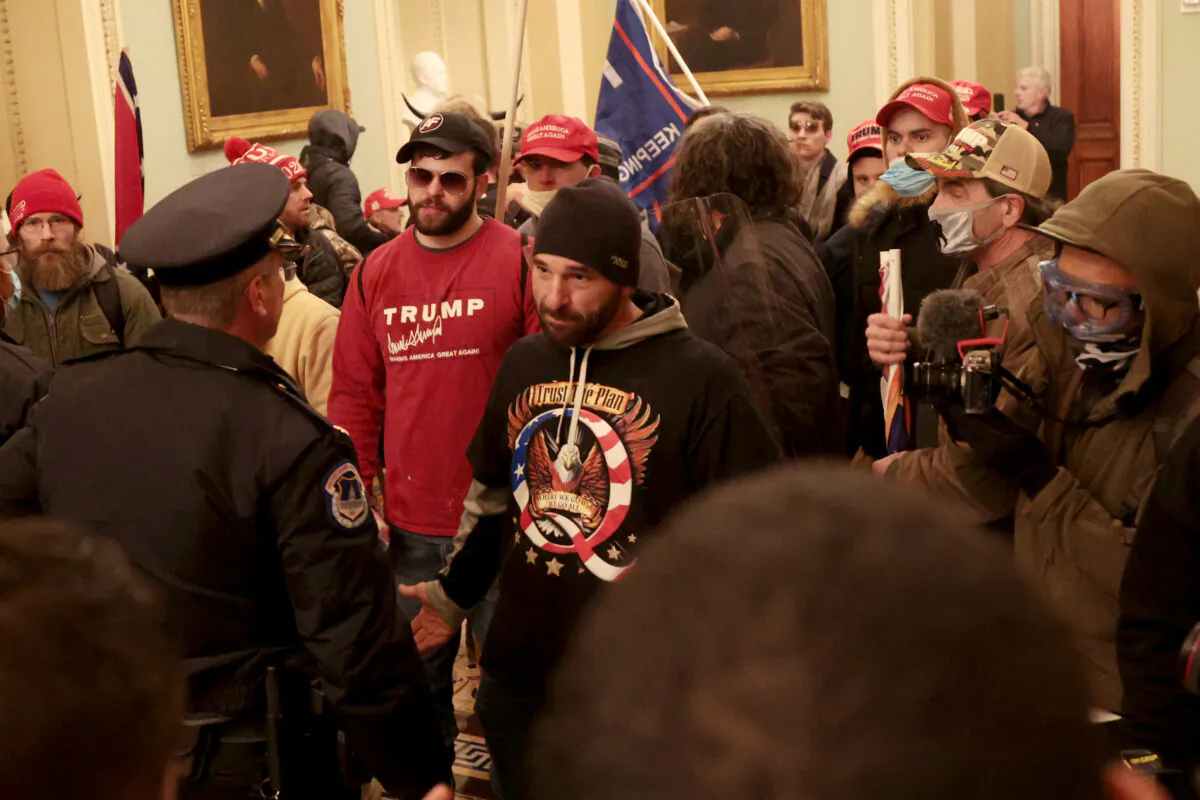 Protesters interact with Capitol Police inside the U.S. Capitol building in Washington on Jan. 6, 2021. (Win McNamee/Getty Images)