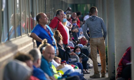 US Weekly Jobless Claims Unexpectedly Fall; Trade Deficit Widens Sharply