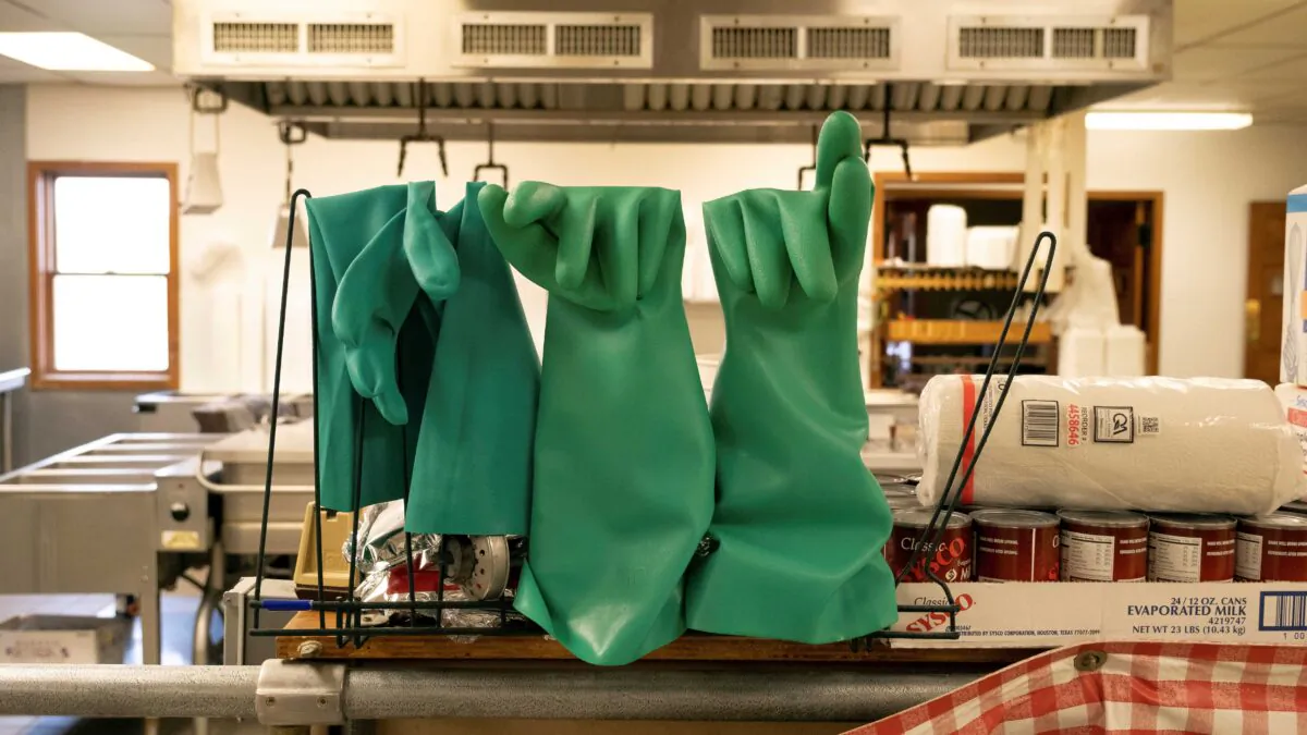 Gloves are seen inside the Brookville Hotel, closed permanently due to the Covid-19 pandemic, in Abilene, Kansas, Oct. 10, 2020. (Arin Yoon/Reuters)
