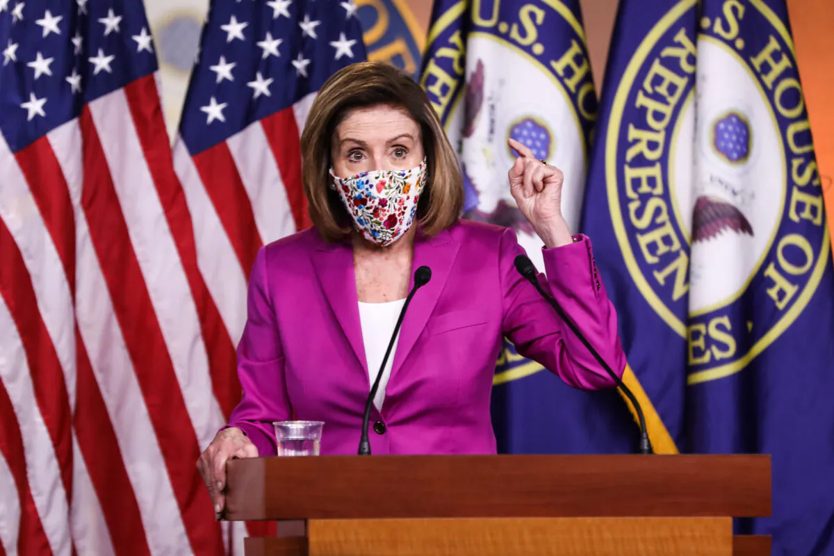House Speaker Nancy Pelosi (D-Calif.) speaks to media at the Capitol in Washington on Jan. 7, 2021. (Charlotte Cuthbertson/The Epoch Times)