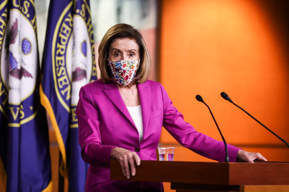 House Speaker Nancy Pelosi (D-Calif.) speaks to media at the Capitol in Washington on Jan. 7, 2021. (Charlotte Cuthbertson/The Epoch Times)