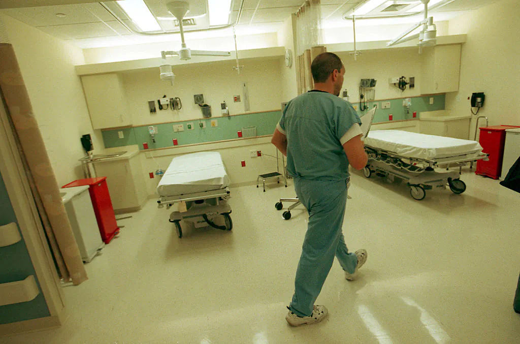 An emergency room nurse walks through the Clinical Decision Unit at the newly-opened Berenson Emergency Department at Beth Israel Deaconess Medical Center in Boston on July 16, 2001. (Darren McCollester/Getty Images)
