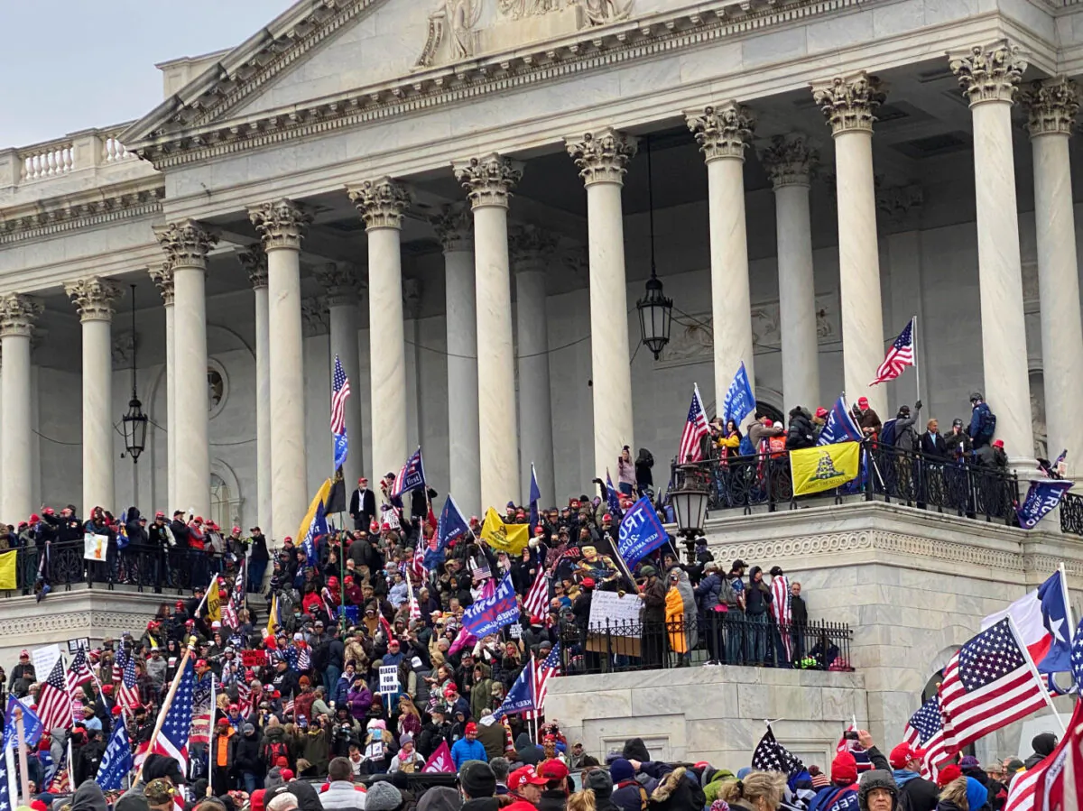 Protesters gather on the steps of the U.S. Capitol in Washington on Jan. 6, 2021. (Courtesy of Mark Simon)
