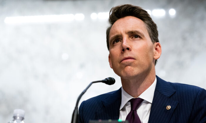 Sen. Josh Hawley (R-Mo.) listens while Supreme Court nominee Judge Amy Coney Barrett testifies before the Senate Judiciary Committee on the second day of her Supreme Court confirmation hearing on Capitol Hill in Washington, D.C., on Oct. 13, 2020. (Anna Moneymaker-Pool/Getty Images)