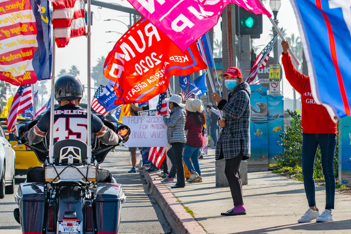Demonstrators partake in a Stop The Steal Rally, in Huntington Beach, Calif., on Jan 6, 2021. (John Fredricks/The Epoch Times)