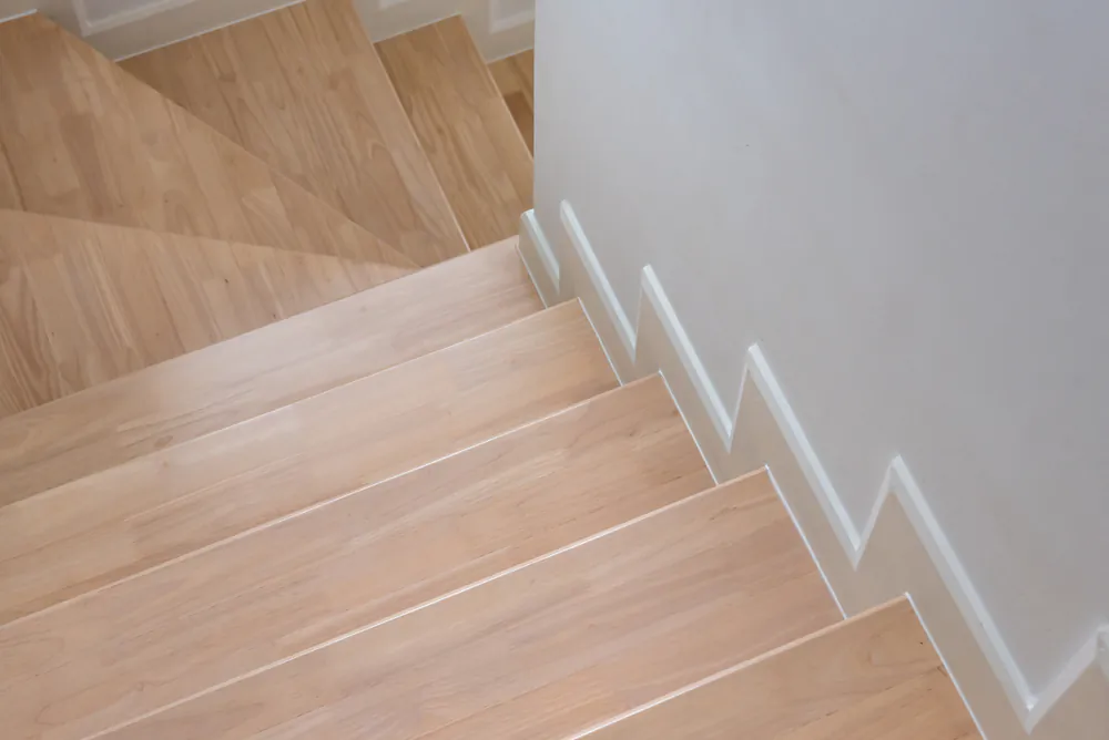 Adding new baseboards and molding, especially ones with contrasting colors to the walls, can jazz up a room. (All About Space/Shutterstock)