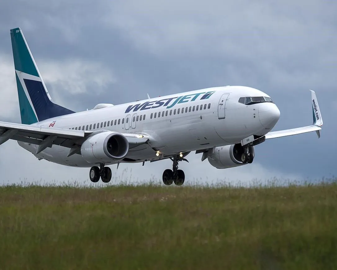 A WestJet flight from Calgary arrives at Halifax Stanfield International Airport in Enfield, N.S., on July 6, 2020. (The Canadian Press/Andrew 
Vaughan)