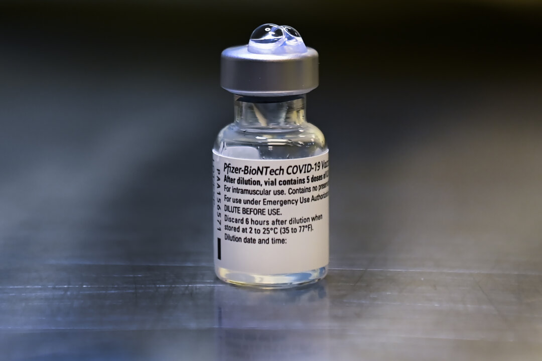 A vial of the Pfizer-BioNTech COVID-19 vaccine is shown at a UHN COVID-19 vaccine clinic in Toronto on Jan. 7, 2021. (Nathan Denette/The Canadian Press)