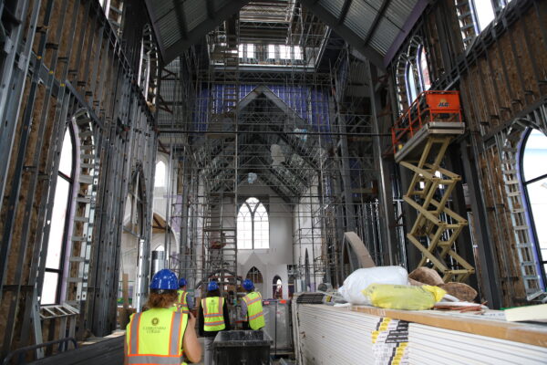 the steel framework underneath the wood paneling of Christ the King Chapel