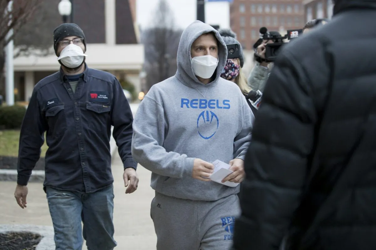 West Virginia Republican state Del. Derrick Evans exits the Sidney L. Christie U.S. Courthouse and Federal Building after being arraigned in Huntington, W.Va., on Jan. 8, 2021. (Sholten Singer/The Herald-Dispatch via AP)