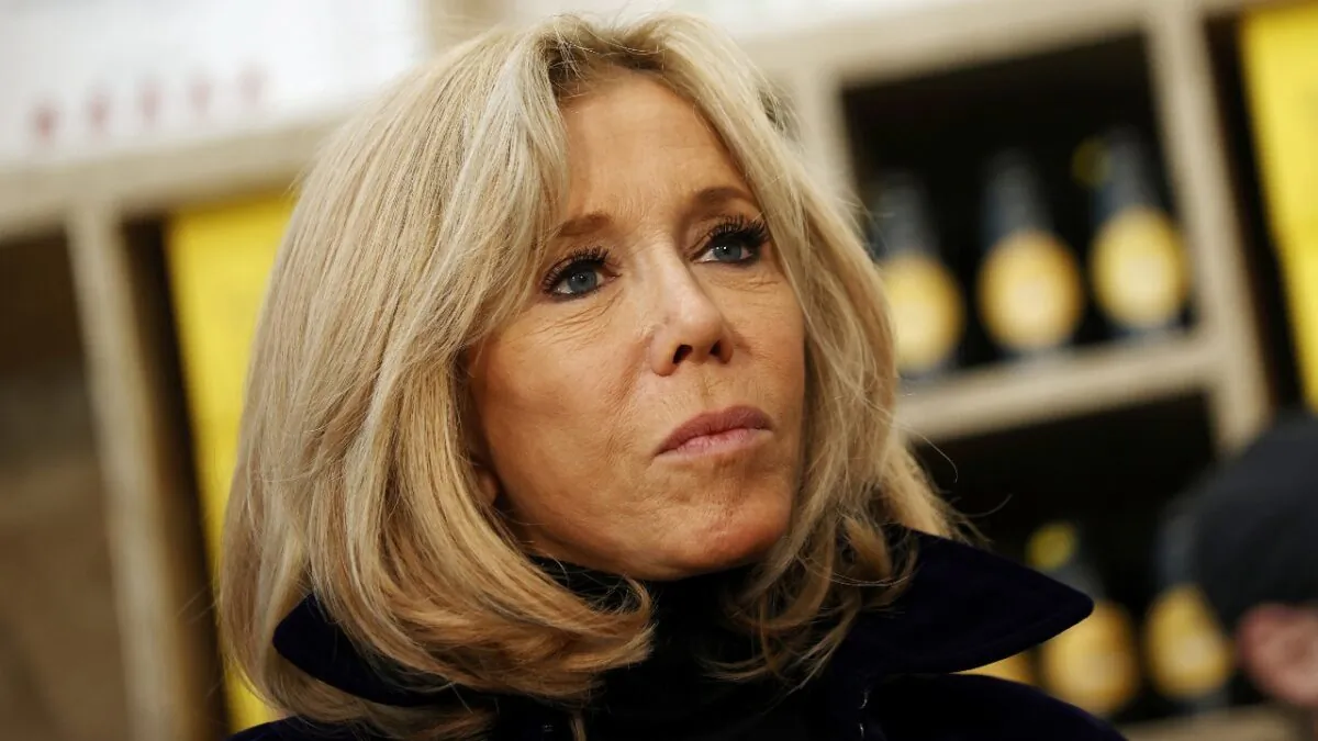 French First Lady Brigitte Macron visits the new Cafe Joyeux coffee shop, which employs people with Down's syndrome and other cognitive disabilities, in Paris, France, on March 9, 2020. (Yoan Valat/Pool via Reuters)