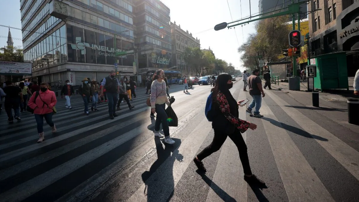 People walk in the streets of downtown Mexico City, Mexico, on Dec. 19, 2020. (Hector Vivas/Getty Images)