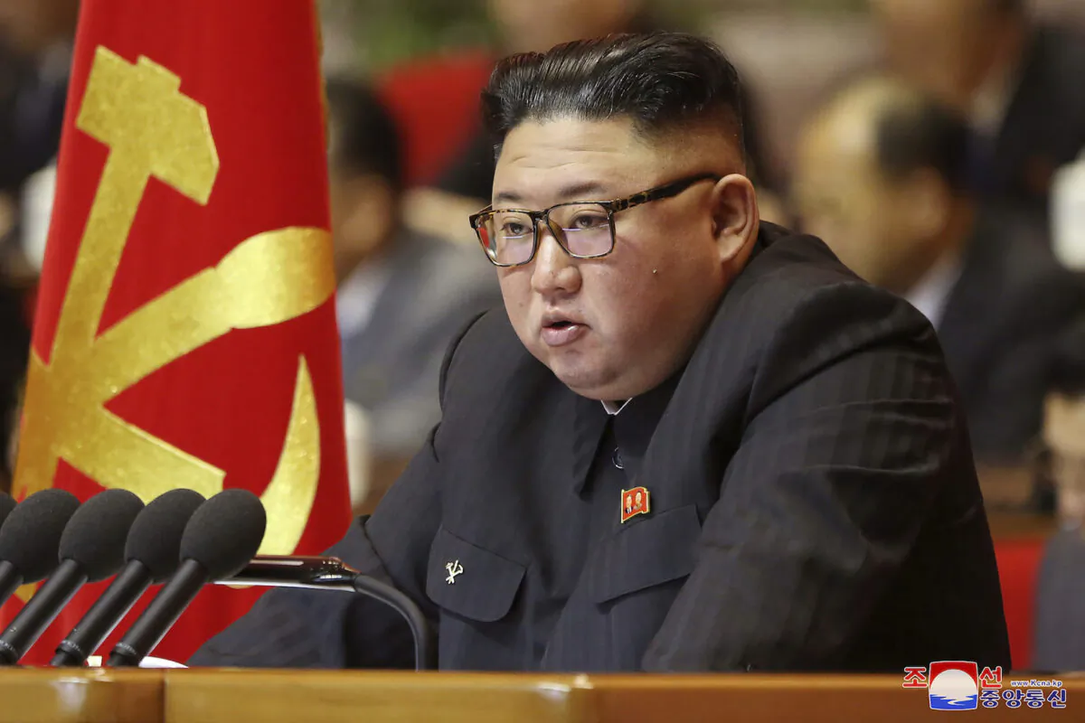 In this photo provided by the North Korean government, North Korean leader Kim Jong Un attends a ruling party congress in Pyongyang, North Korea on Jan. 6, 2021. (Korean Central News Agency/Korea News Service via AP)