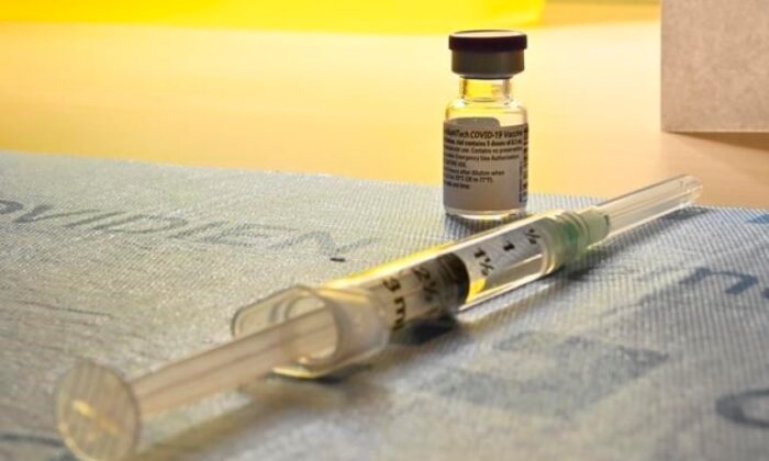 A syringe of the COVID-19 vaccine waits to be administered in Toronto on Dec. 14, 2020. (The Canadian Press/Frank Gunn)