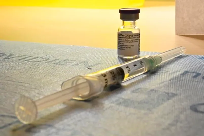 A syringe of the COVID-19 vaccine waits to be administered in Toronto on Dec. 14, 2020. (The Canadian Press/Frank Gunn)
