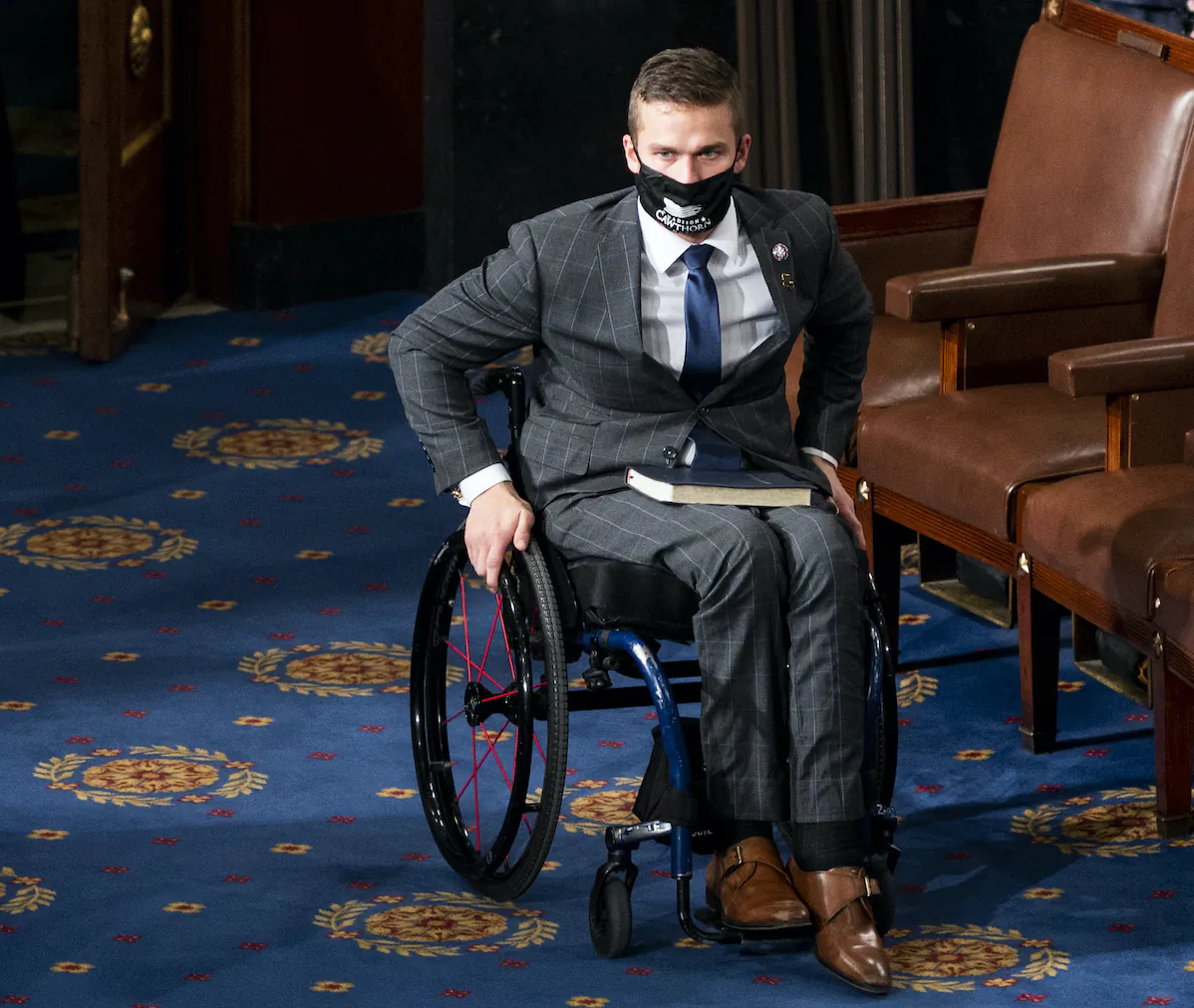 Rep. Madison Cawthorn (R-N.C.) arrives on the House floor in the Capitol before being sworn in Washington, D.C. on Jan. 3, 2021. (Bill Clark - Pool/Getty Images)