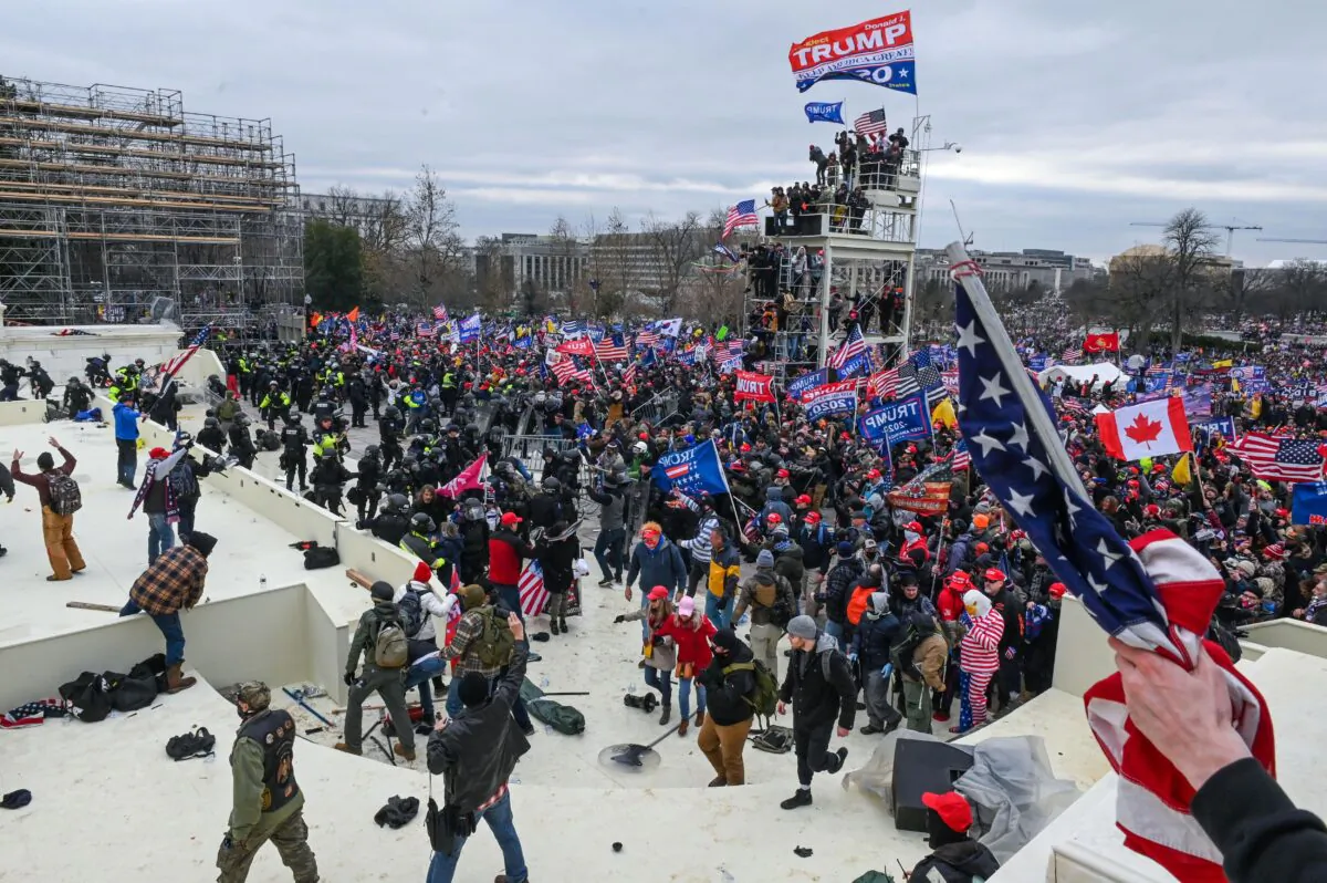 Protesters clash with police and security forces at the U.S. Capitol in Washington on Jan. 6, 2021. (Roberto Schmidt/AFP via Getty Images)