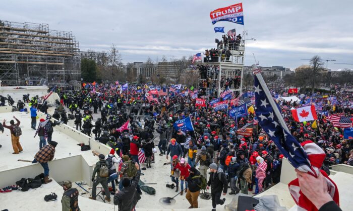Protesters clash with police and security forces at the U.S. Capitol in Washington on Jan. 6, 2021. (Roberto Schmidt/AFP via Getty Images)