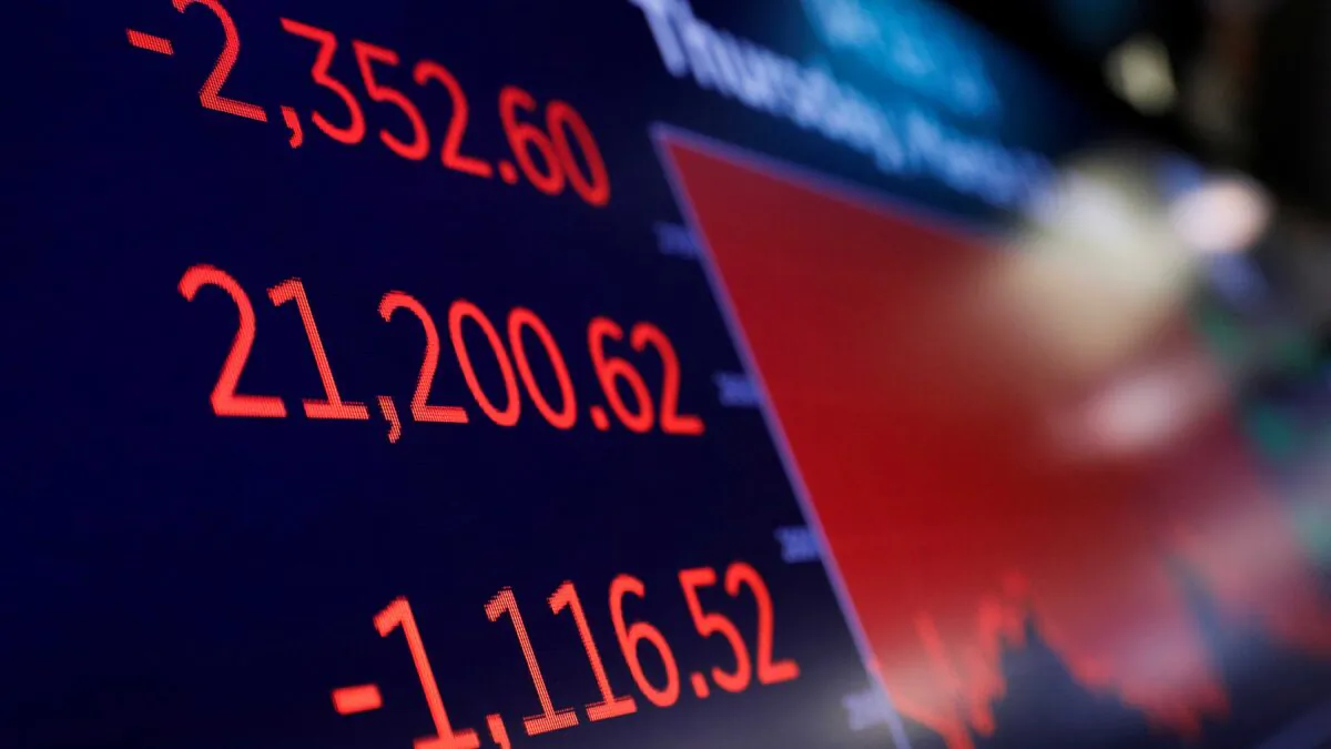 A price screen display above the floor of the New York Stock Exchange (NYSE) after the close of trading in New York on March 12, 2020. (Brendan McDermid/Reuters)
