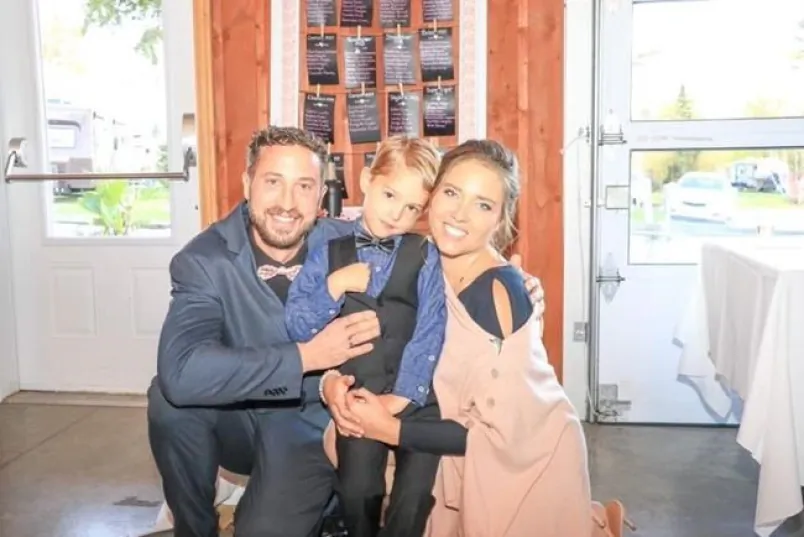 Dr. Karine Dion, right, poses with her husband, David Daigle, left, and their son, Jacob, in this undated handout photo. Dion's family is speaking out after she took her own life in January 2021. (The Canadian Press/HO — David Daigle)