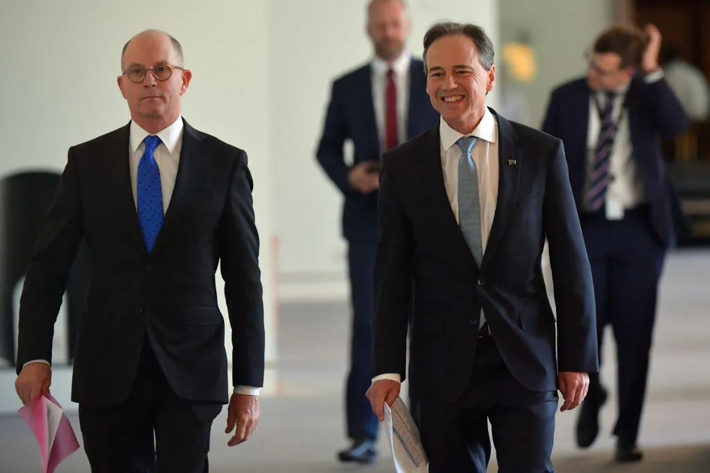 Australia's Acting Chief Medical Officer Paul Kelly (left) and Minister for Health Greg Hunt in the Mural Hall at Parliament House in Canberra, Australia on Dec. 8, 2020. (Sam Mooy/Getty Images)