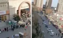 Chinese Authorities Relocate 20,000 People for Virus Quarantine as Locals Question Official Data
