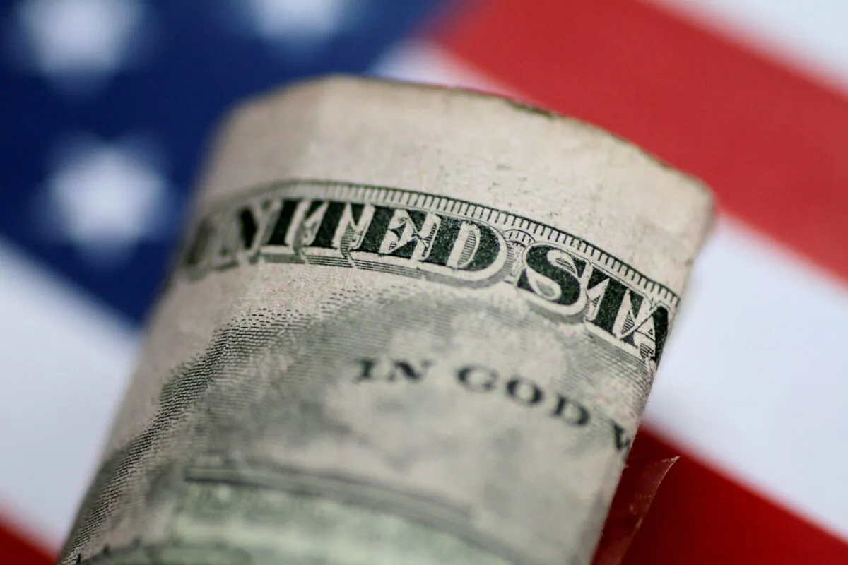 A $5 bill is seen in this illustration photo on June 1, 2017. (Thomas White/Illustration/Reuters File Photo)