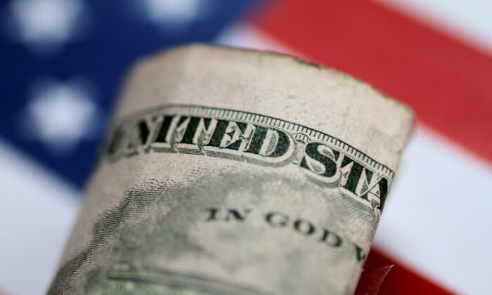 A $5 bill is seen in this illustration photo on June 1, 2017. (Thomas White/Illustration/Reuters File Photo)
