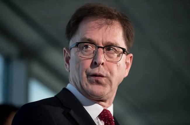 British Columbia Health Minister Adrian Dix responds to questions during a news conference regarding the novel coronavirus COVID-19, in Vancouver, on Mar. 14, 2020. (The Canadian Press/Darryl Dyck)