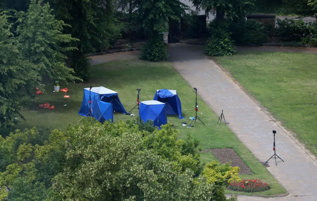 A picture shows police tents and equipment at the scene of a fatal stabbing incident that is being treated as terrorism in Forbury Gardens park in Reading, west of London, on June 21, 2020. (AFP via Getty Images)