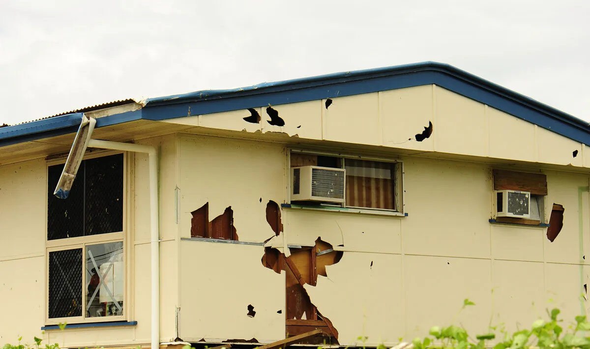A storm damaged house is seen in the Townsvile suburb of Gulliver in Townsville, Australia on March 21, 2012 . (Leigh Turner/Getty Images)