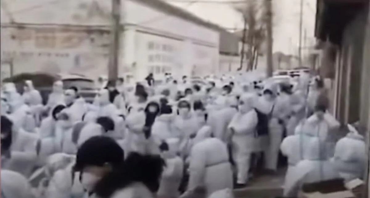 Villagers from Sanlizhuang village in Nangong, northern China's Hebei Province are waiting to take shuttle buses to a quarantine center on Jan. 13, 2021. (Screenshot/Video Provided to The Epoch Times by interviewee)