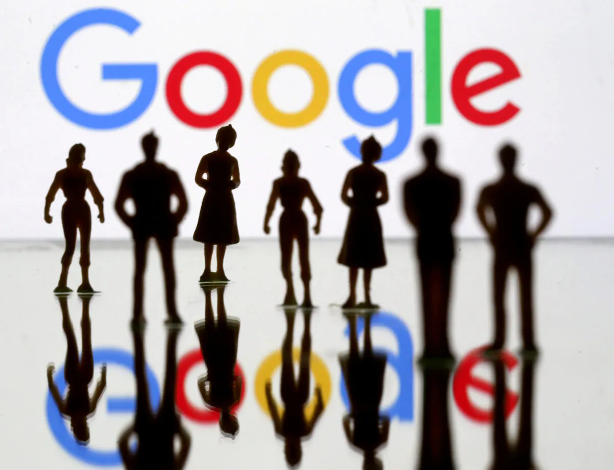 Small toy figures are seen in front of Google logo in this illustration picture on April 8, 2019. (Dado Ruvic/Reuters)
