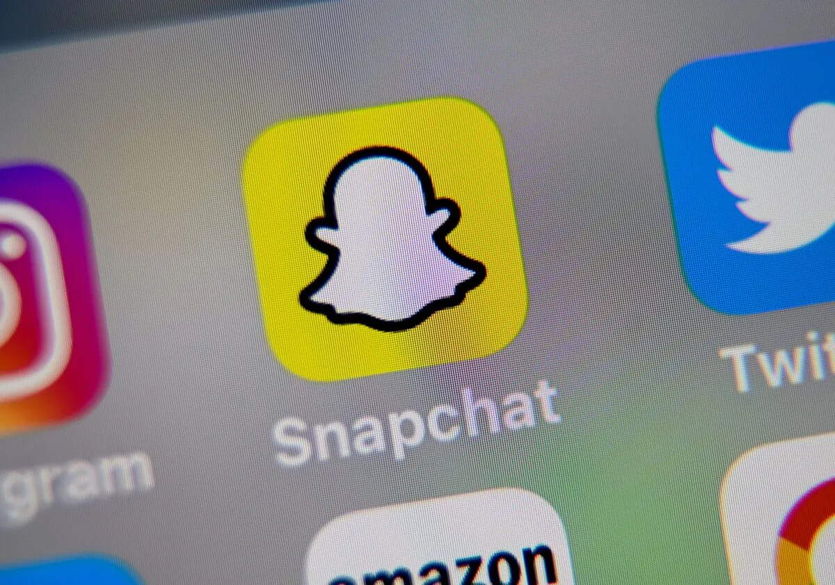 A picture of a mobile phone shows the logo of Snapchat, on Oct. 1, 2019. (Denis Charlet/AFP via Getty Images)
