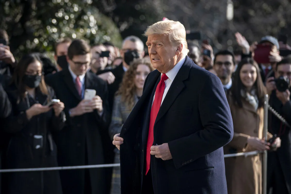 President Donald Trump exits the White House to walk toward Marine One on the South Lawn in Washington on Jan. 12, 2021. (Drew Angerer/Getty Images)