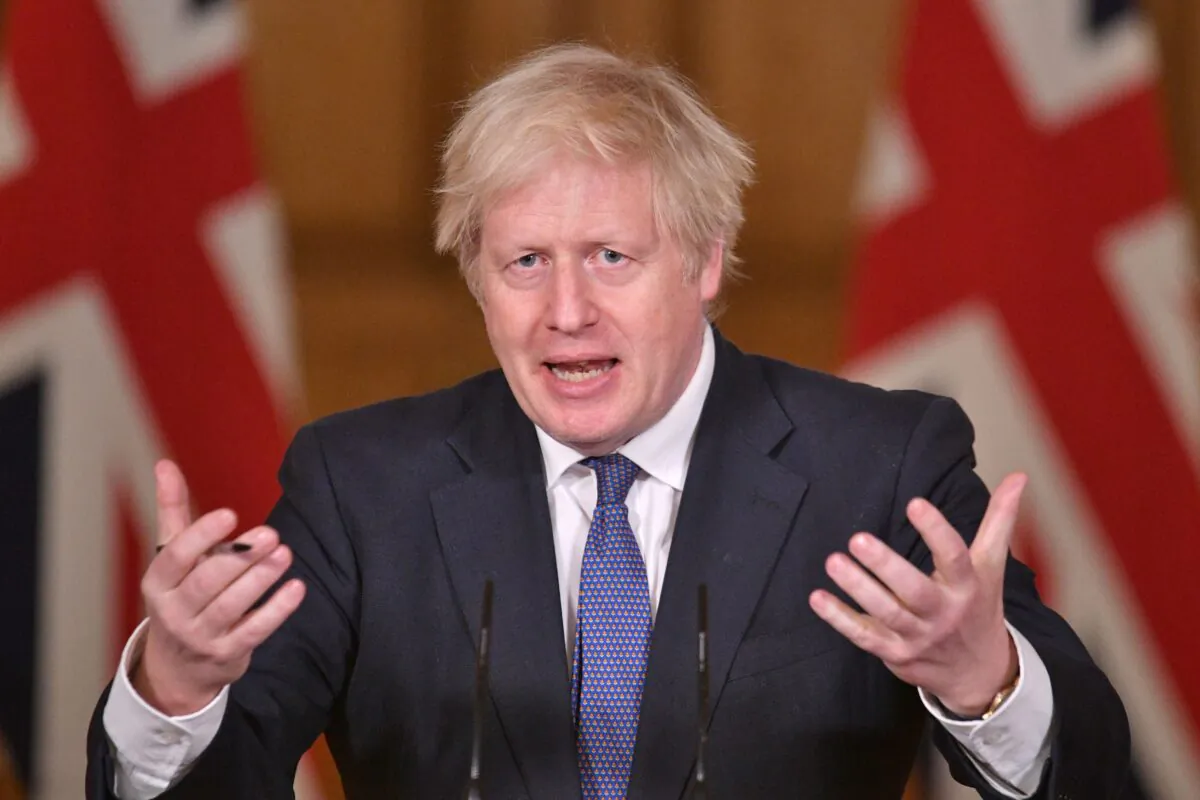 Britain's Prime Minister Boris Johnson speaks during a virtual press conference at 10 Downing Street in central London, on Jan. 15, 2021. (Dominic Lipinski /Pool/AFP via Getty Images)