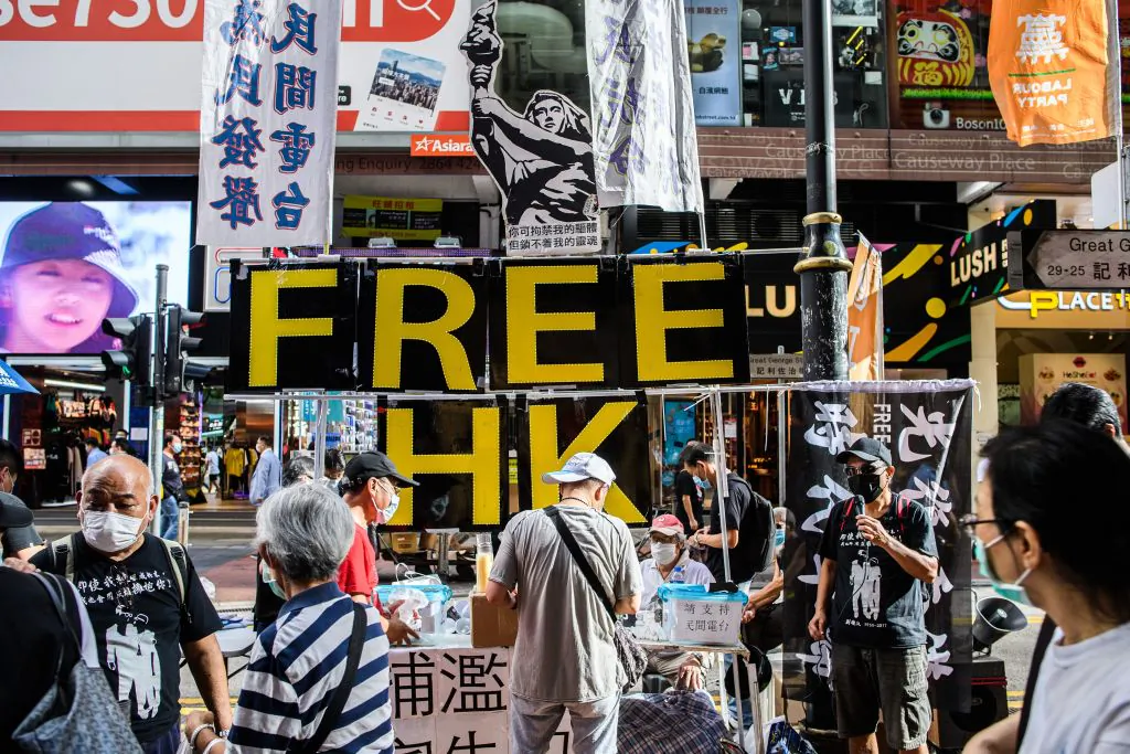 A large display showing the Goddess of Democracy (top C) and lettering that reads 'Free HK' is seen a stall on a pavement near Victoria Park in Hong Kong on June 4, 2020, after an annual vigil that traditionally takes place in the park to mark the 1989 Tiananmen Square crackdown was banned on public health grounds because of the coronavirus pandemic. (Anthony Wallace /AFP via Getty Images)