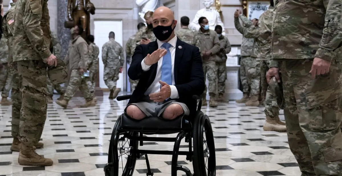 Rep. Brian Mast (R-Fla.) (C) gives members of the National Guard a tour of the U.S. Capitol in Washington, on Jan. 13, 2021. (Stefani Reynolds/Getty Images)