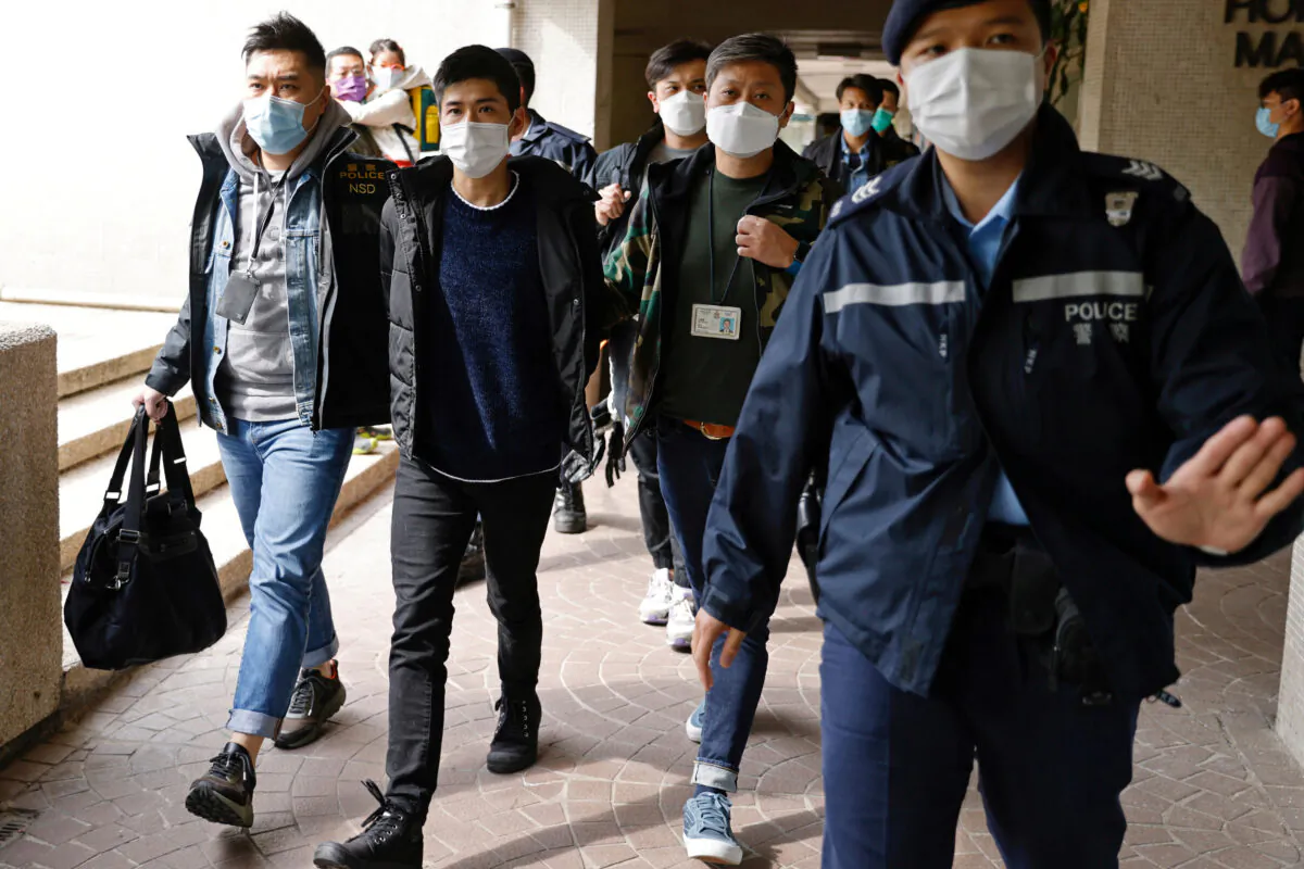 Pro-democracy activist Lester Shum is taken away by police officers in Hong Kong, on Jan. 6, 2021. (REUTERS/Tyrone Siu/File Photo)