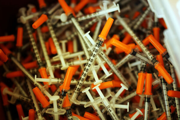 Used syringes are discarded at a needle exchange clinic
