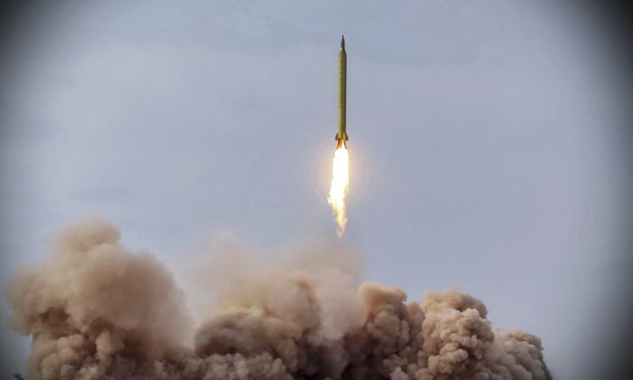 Iran’s paramilitary Revolutionary Guard conducted a drill on Jan. 16, 2021, launching anti-warship ballistic missiles at a simulated target in the Indian Ocean, state television reported, amid heightened tensions over Tehran’s nuclear program and a U.S. pressure campaign against the Islamic Republic. (IRG/Sepahnews via AP)