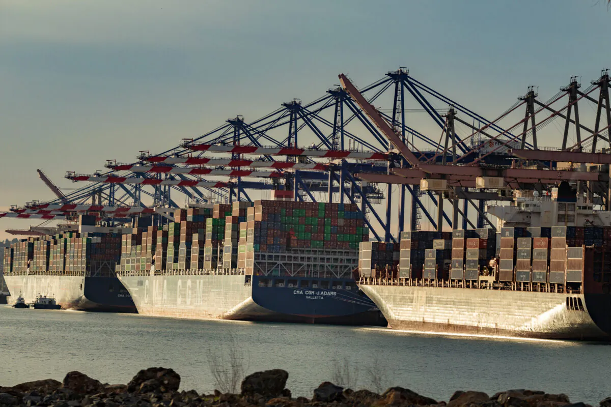 Ships are loaded with cargo at the Port of Los Angeles on Jan. 12, 2021. (John Fredricks/The Epoch Times)