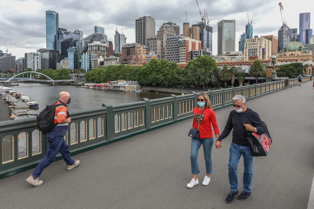 A general view of pedestrians crossing the bridge with the Yarra River and CBD in the background on Nov. 6, 2020 in Melbourne, Australia. (Asanka Ratnayake/Getty Images)