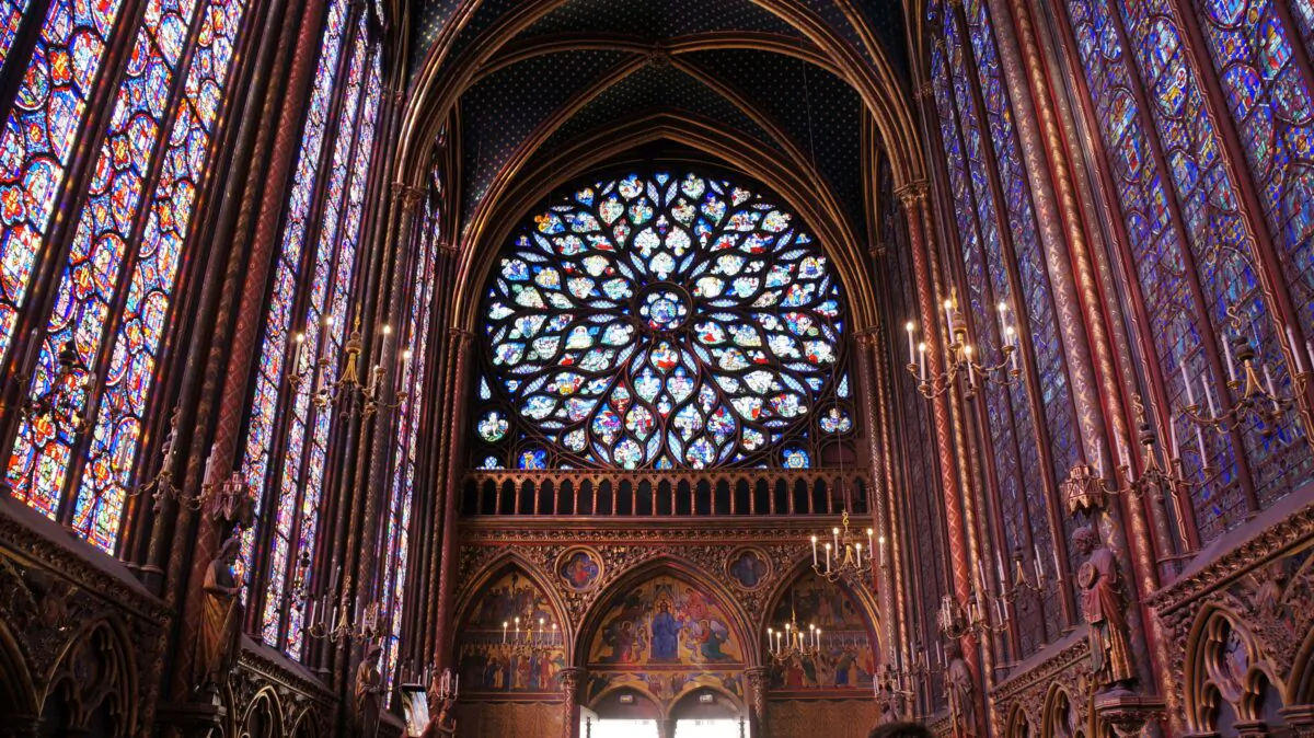 The 15th-century rose window in the Flamboyant Gothic style depicts St. John’s vision of the Apocalypse. (Marie He/The Epoch Times)