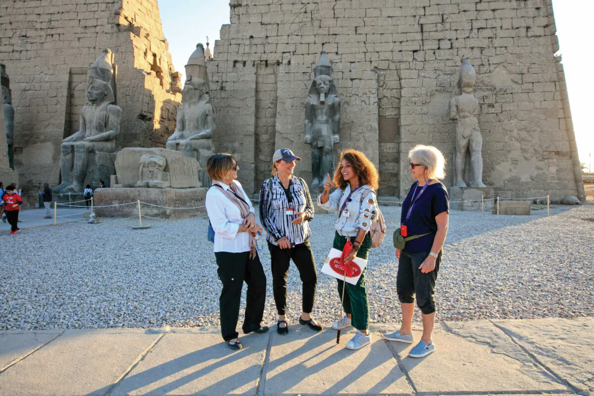 Members of an Overseas Adventure Travel tour group visit ancient monuments in Egypt. (Courtesy of the Grand Circle Corp.)
