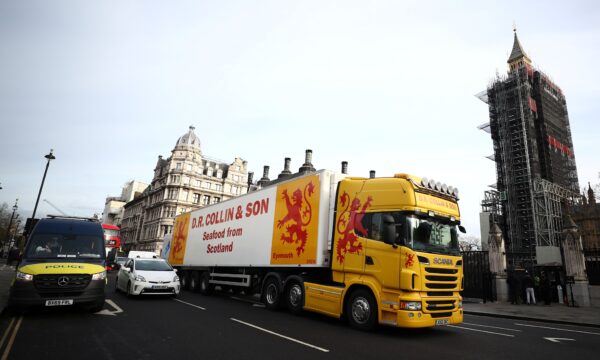 A lorry drives during a protest
