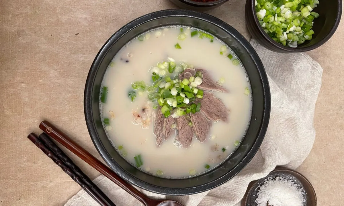 Serve your soup with rice, scallions, radish kimchi, and kosher salt, to season to taste. (Judy Joo)